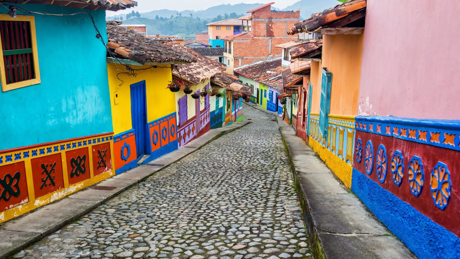 An ally was with nightly colored buildings on each side