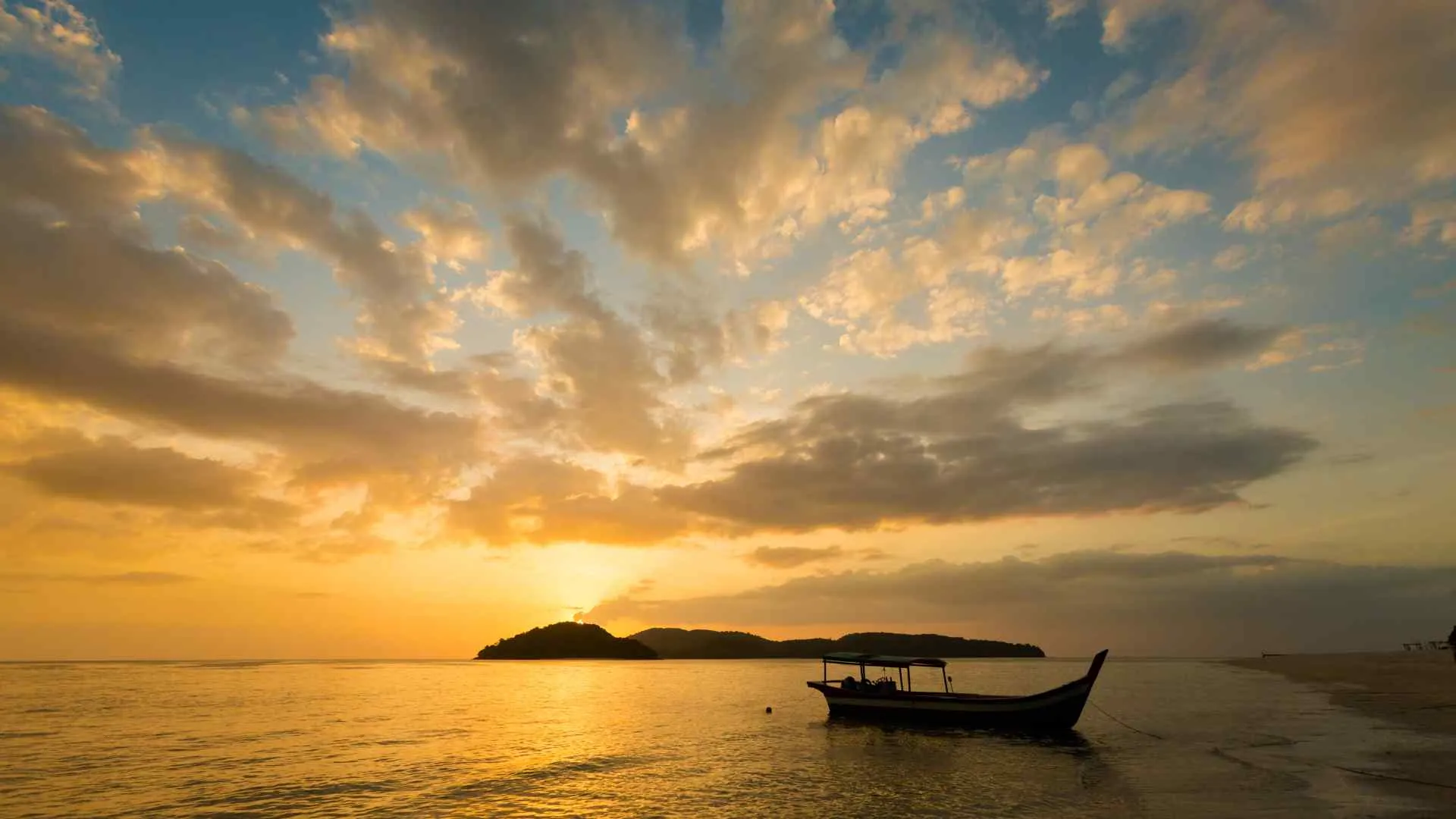 wooden boat Langkawi sunset wooden boat Langkawi sunset